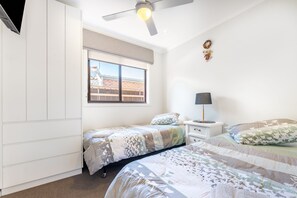 3 bedrooms, desk, iron/ironing board, travel crib