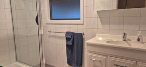 Shower, towels, soap, shampoo