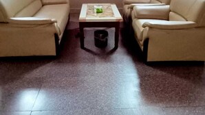 Habitación doble Deluxe | Área de sala de estar