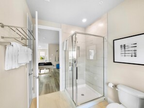 Shower, hair dryer, towels, soap