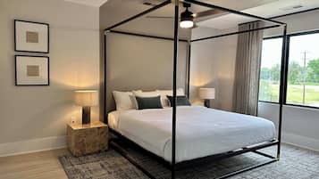 4 bedrooms, laptop workspace, iron/ironing board, bed sheets