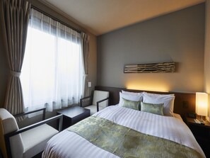 Habitación estándar doble | Escritorio, cortinas opacas, wifi gratis y ropa de cama