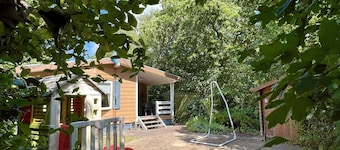 Cosy chalet for 4 persons, garden with lawn and lots of privacy, WiFi, close to beach, forest and dunes