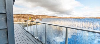 Our off-grid Boathouse with hot tub sleeps 2 with amazing lochside views.