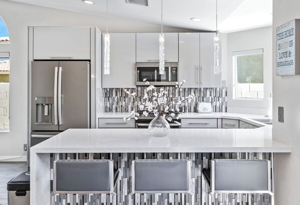 Fridge, microwave, oven, stovetop - Hercules House- Four Bedroom Home (Palm Springs)