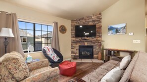 Smart TV, fireplace, books