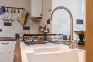 Microwave, oven, cookware/dishes/utensils