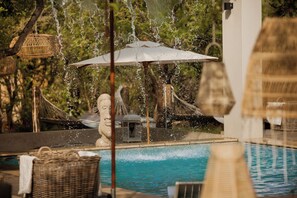 Outdoor pool, free pool cabanas, pool umbrellas