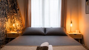 デラックス アパートメント | 1 室のベッドルーム、ノートパソコン用作業スペース、防音設備、アイロン / アイロン台