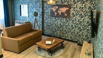 Deluxe-Apartment | Wohnbereich | Fernseher, Netflix, Streaming-Dienste