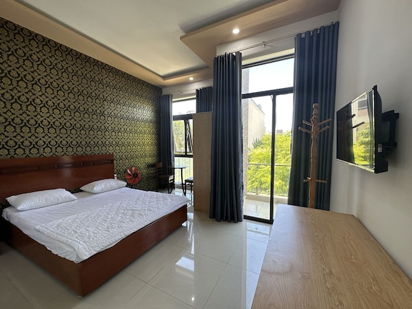 Habitación doble Deluxe | Minibar, escritorio, espacio para trabajar con laptop y wifi gratis 