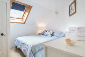 4 bedrooms, iron/ironing board, travel cot, WiFi