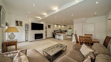 Luxury Penthouse | Living area | 55-inch Smart TV with satellite channels