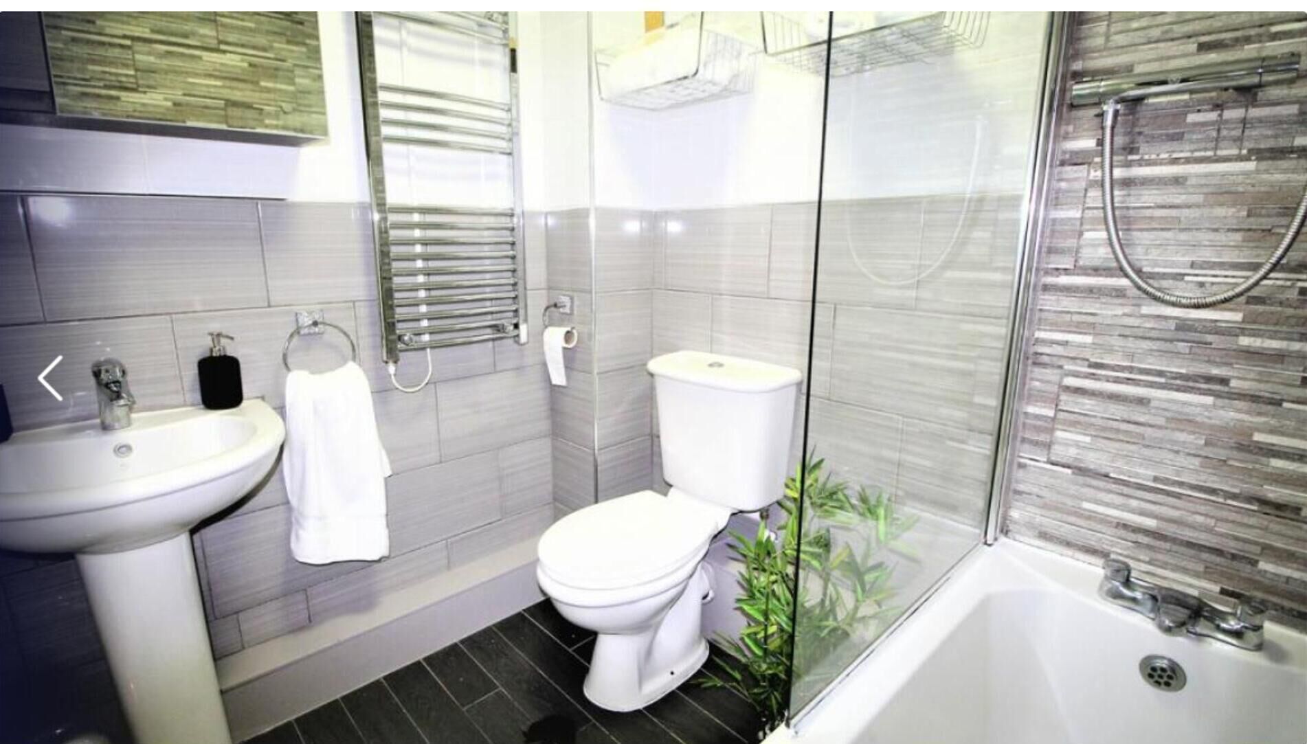 Separate tub and shower, deep soaking tub, hair dryer, towels