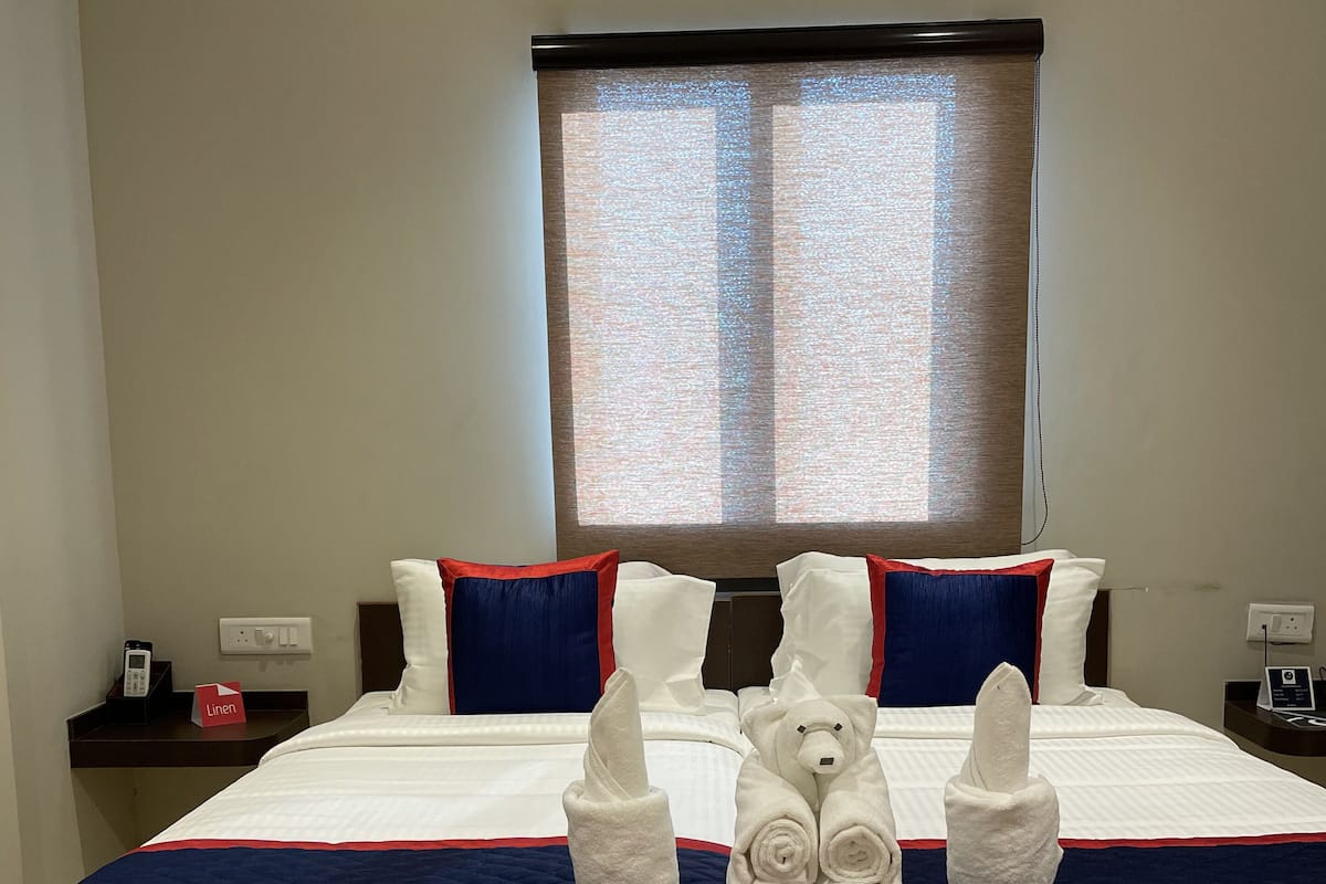 Kamar Twin Deluks | 1 kamar tidur, seprai premium, brankas, dan meja kerja