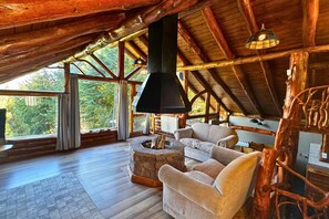 Cabin, 2 Bedrooms (Coihue) | Living area | 45-inch LED TV with cable channels