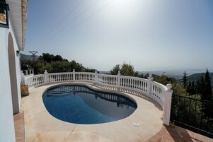 Outdoor pool, open 7:00 AM to 11:00 PM, pool loungers