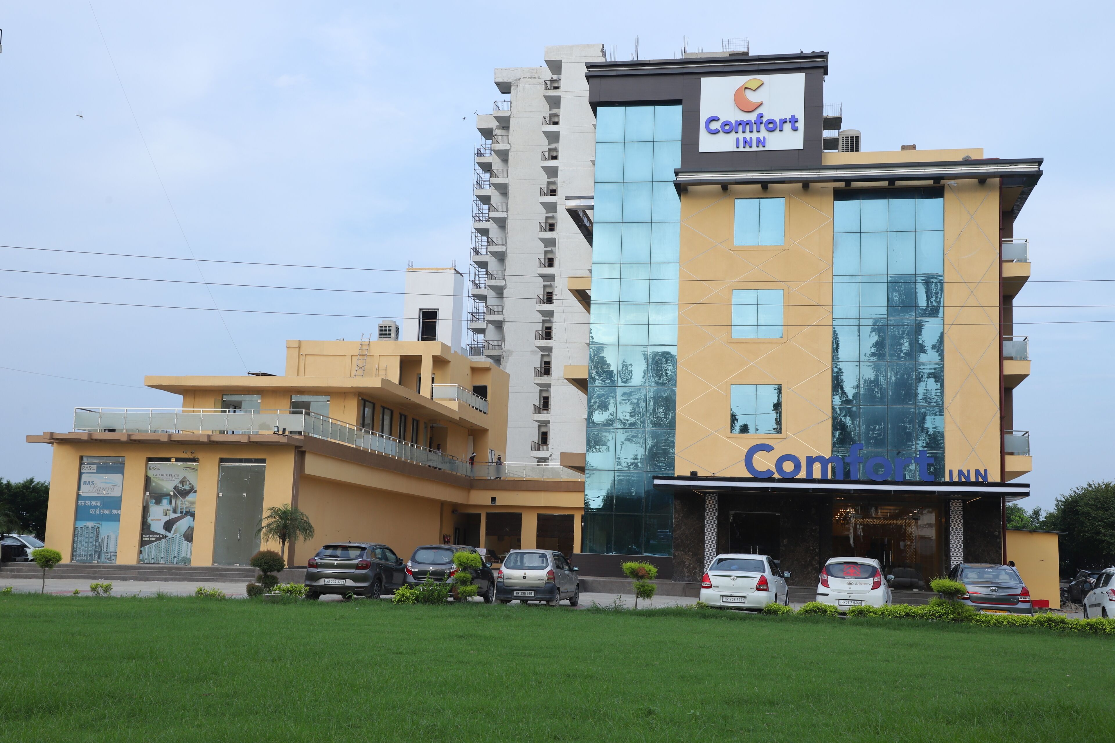A multi-story building with a prominent 'Comfort Inn' sign.