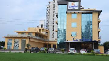A multi-story building with a prominent 'Comfort Inn' sign.