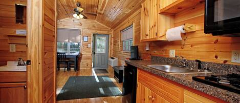 Microwave, stovetop, coffee/tea maker, cookware/dishes/utensils