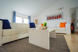 Deluxe Apartment | Living area | Smart TV