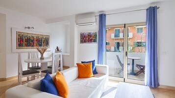 Premium bedding, down comforters, memory foam beds, in-room safe