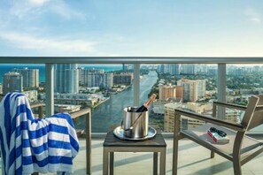 Enjoy breathtaking views of the city and water from your balcony.