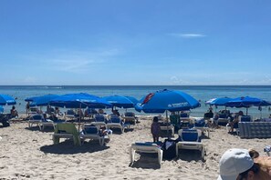 Relax under the shade of Esteban's Place umbrellas, surrounded by lounge chairs and the soothing sound of the ocean.
