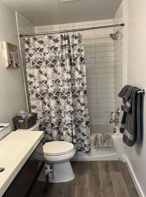 Hair dryer, towels, soap, toilet paper