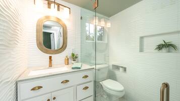 Hair dryer, towels, soap, shampoo