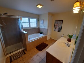Shower, jetted tub, hair dryer, towels