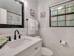 Hair dryer, towels, soap, shampoo
