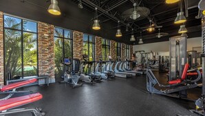 A gym with treadmills, stationary bikes, and weight machines. - Mickey's Manor: Private Pool & Resort Access (Davenport)