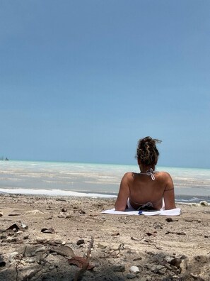 Private beach, sun-loungers, beach towels, beach massages