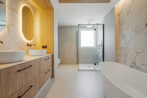 Bathtub, hair dryer, towels