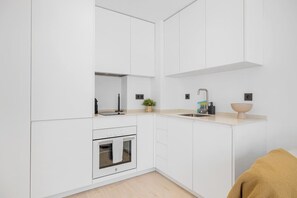 Réfrigérateur, four, plaque de cuisson, lave-vaisselle