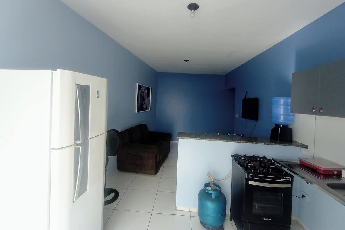 Economy Apartment, 1 Bedroom, Kitchen | Private kitchen | Fridge, cookware/dishes/utensils, cleaning supplies, dining tables