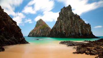 En la playa, arena blanca