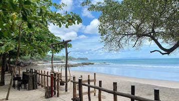 On the beach, sun-loungers, beach towels