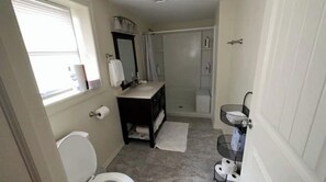 Hair dryer, towels, soap, shampoo