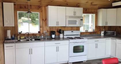 Lakefront Cottage on beautiful Miles Pond w/dock.