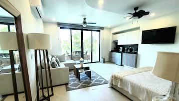 Premium Studio | Living area | 43-inch Smart TV with satellite channels