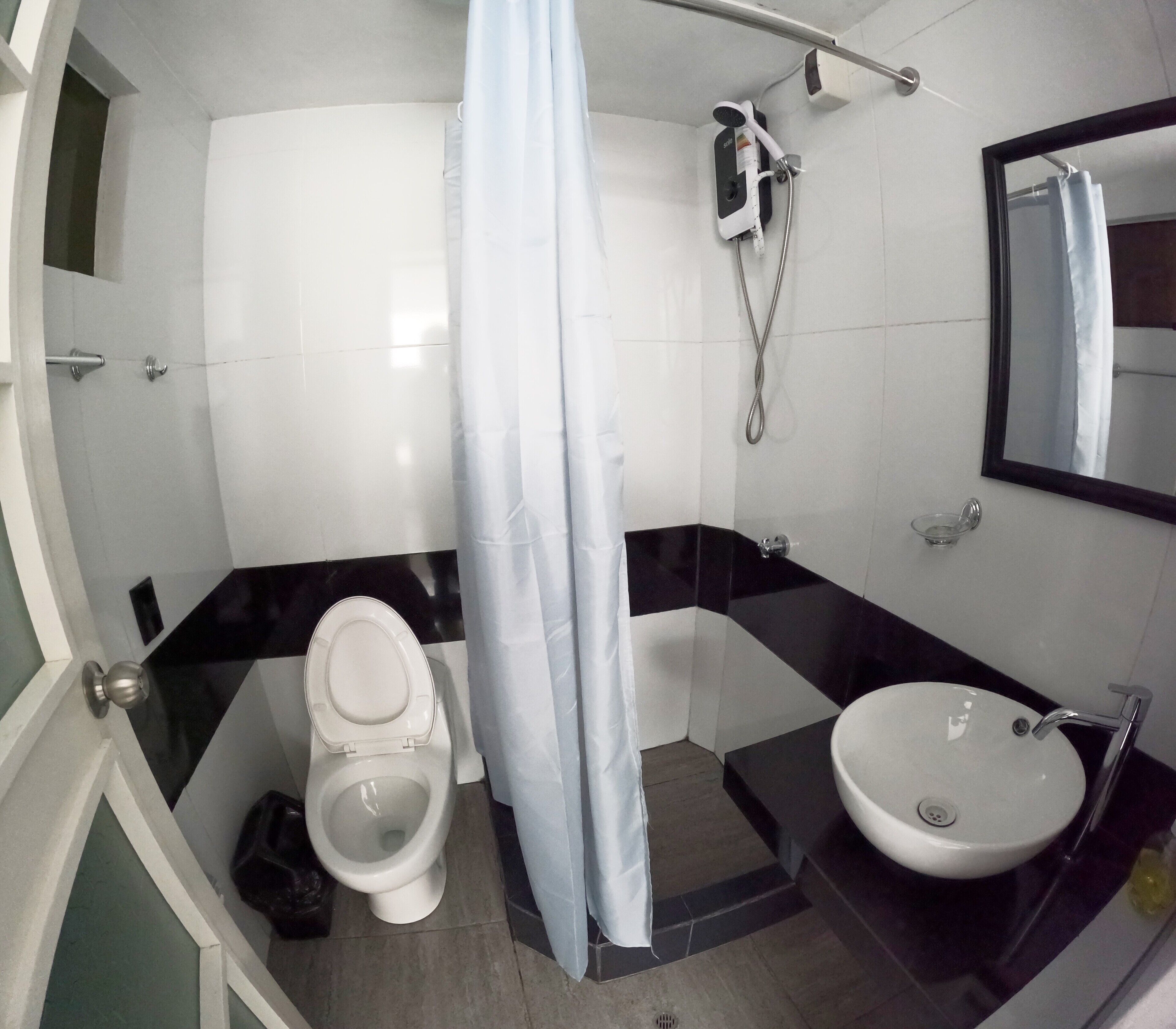 Shower, towels, soap, toilet paper