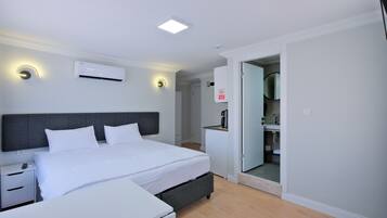 Superior Studio Suite, 1 King Bed with Sofa bed, Balcony, Mountain View | 1 bedroom, in-room safe, desk, free WiFi