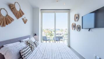 2 chambres, coffres-forts dans les chambres, fer et planche Ă repasser