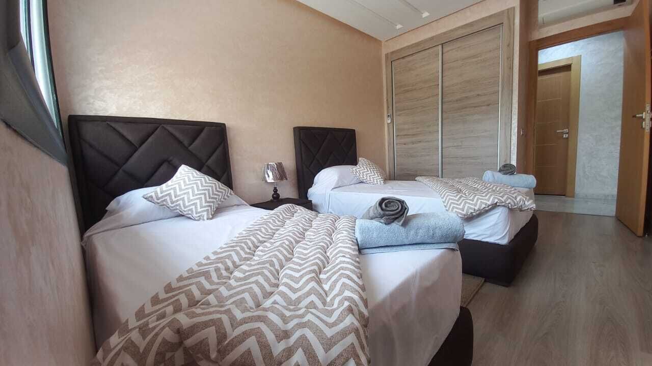 2 dormitorios, tabla de planchar con plancha, cuna de viaje y wifi