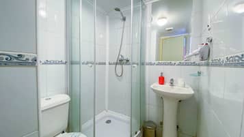 Hair dryer, towels, soap, shampoo