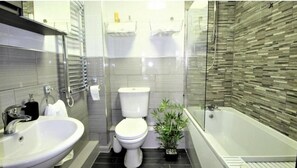 Bathtub, hair dryer, towels
