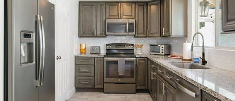 Microwave, toaster, blender, cookware/dishes/utensils