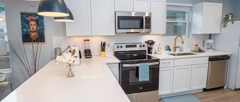 Microwave, oven, dining tables